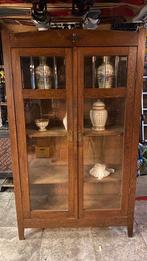 Antieke eiken vitrinekast, Ophalen