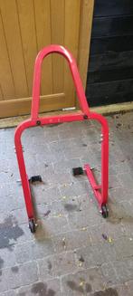 Paddockstand achter, Ophalen