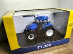 Te koop UH New Holland T7.300., Hobby en Vrije tijd, Modelauto's | 1:32, Ophalen of Verzenden, Nieuw, Tractor of Landbouw, Universal Hobbies