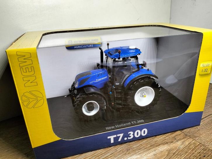 Te koop UH New Holland T7.300., Hobby en Vrije tijd, Modelauto's | 1:32, Nieuw, Tractor of Landbouw, Universal Hobbies, Ophalen of Verzenden