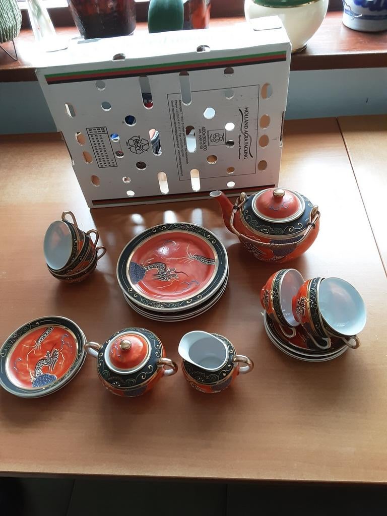 Theeservies met draken, Ophalen