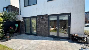 buitendeur 2.00x2.35m (Antractiet buitenzijde en wit binnezi beschikbaar voor biedingen