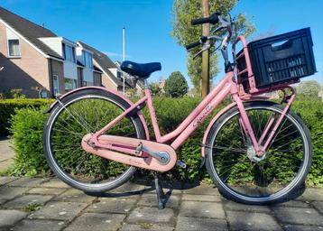 Roze Gazelle fiets: Miss Grace28 inch inclusief zwart kratje