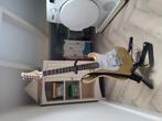 Gort gitaar met standaard
