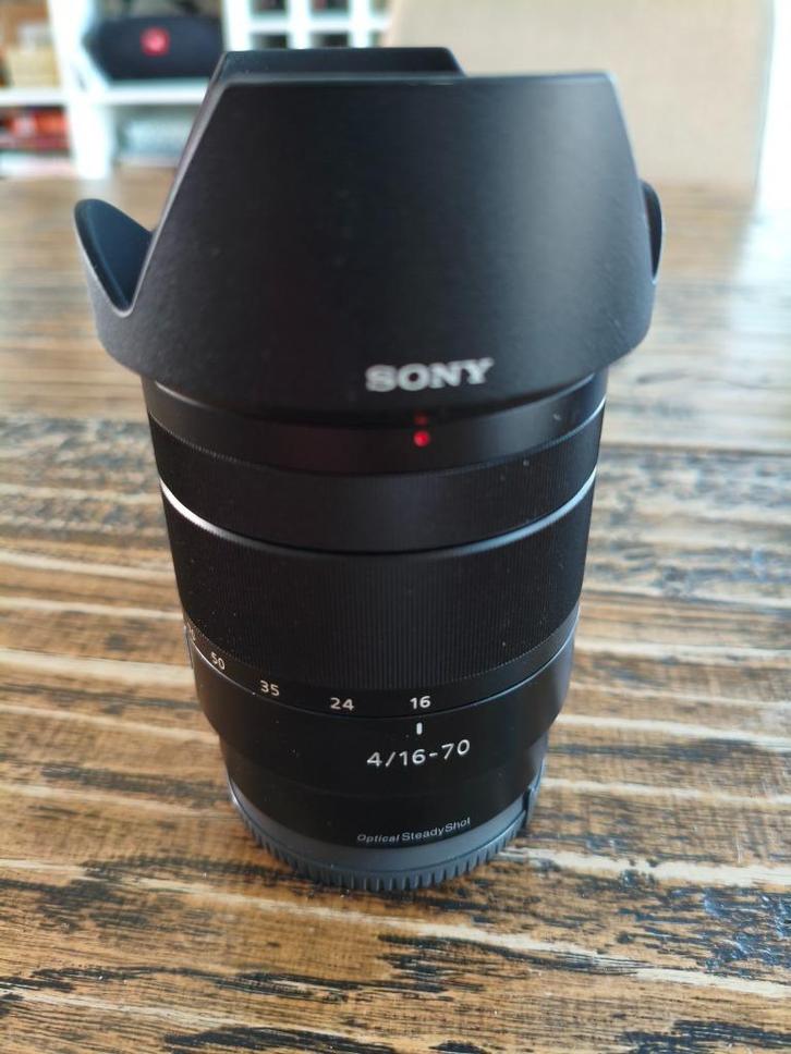 Sony Zeiss Vario-Tessar T*E 16-70mm f/4 ZA OSS met garantie, Audio, Tv en Foto, Fotografie | Lenzen en Objectieven, Zo goed als nieuw