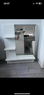 Spiegel met plankjes, Ophalen