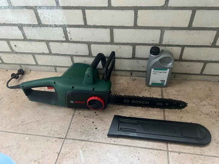 Bosch Universal Chain 35 Kettingzaag, Tuin en Terras, Heggenscharen, Gebruikt, Elektrisch, Ophalen of Verzenden