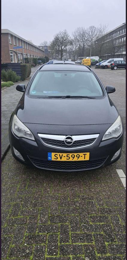 Opel Astra 1.4 Turbo 88KW Sports Tourer 2011 Zwart, Auto's, Opel, Particulier, Astra, ABS, Achteruitrijcamera, Airbags, Airconditioning