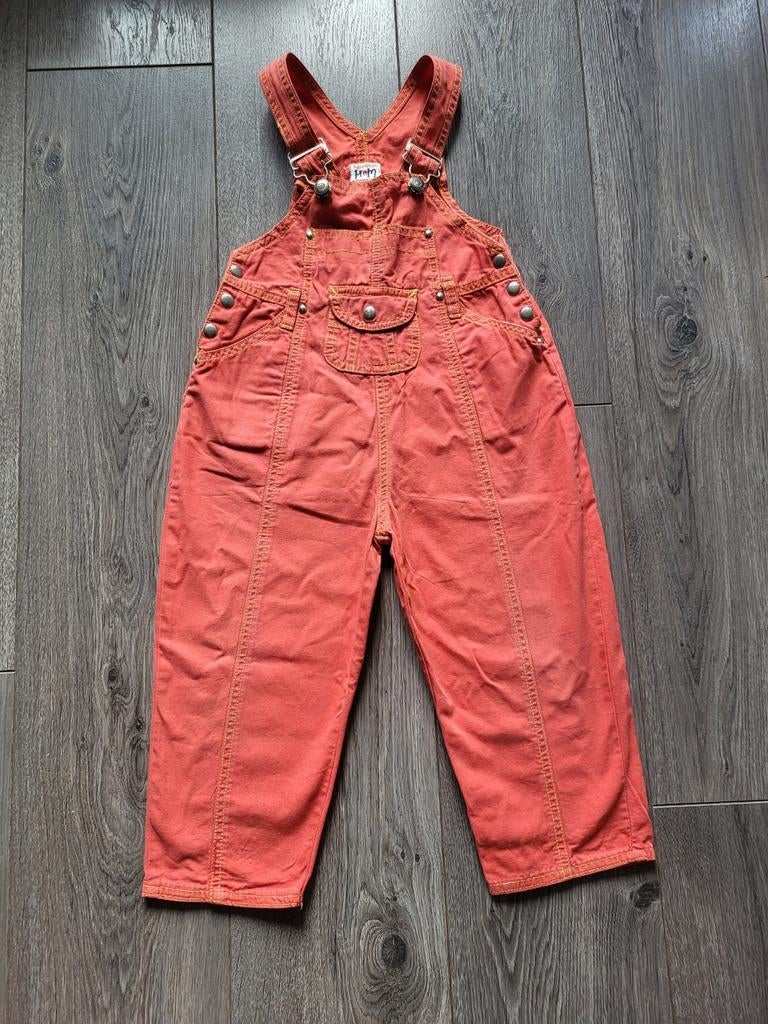 Vrolijk en fleurig tuinbroekje in warm oranje, Kinderen en Baby's, Kinderkleding | Maat 98, Ophalen of Verzenden, Zo goed als nieuw