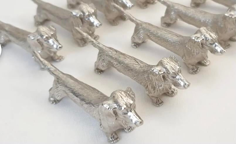 4 Verzilverde Tekkels messenleggers vintage, Ophalen