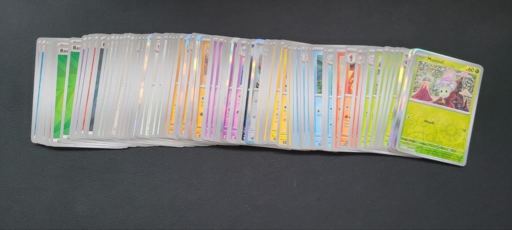 Pokemon TCG Surging Sparks bulk, Ophalen of Verzenden, Zo goed als nieuw, Meerdere kaarten