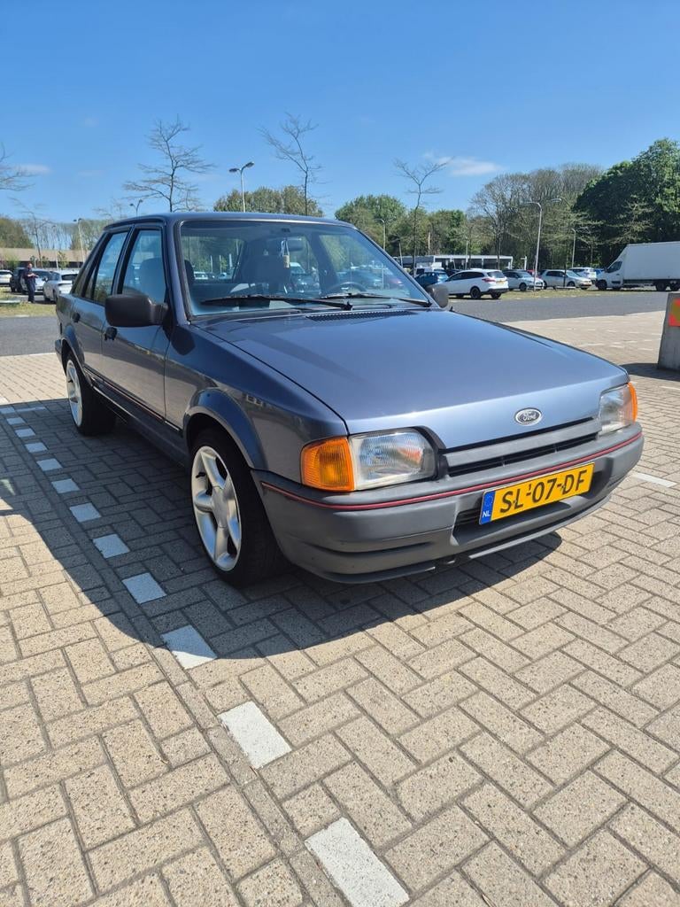 Ford Escort 1.4 1987 bijna oldtimer, Auto's, Ford, Escort, Stof, 4 cilinders, Origineel Nederlands