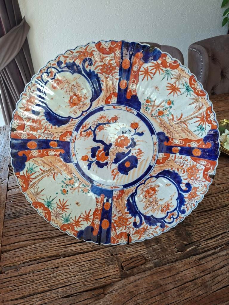 Antieke zeer grote imari schotel, Ophalen