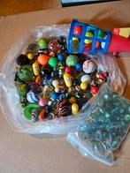 Knikkers en balletjes schieter met ballen, Ophalen