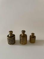 3 gewichtjes brons of messing, Ophalen