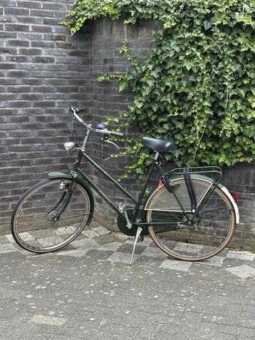 Mooie groene stadsfiets Hollandsport beschikbaar voor biedingen