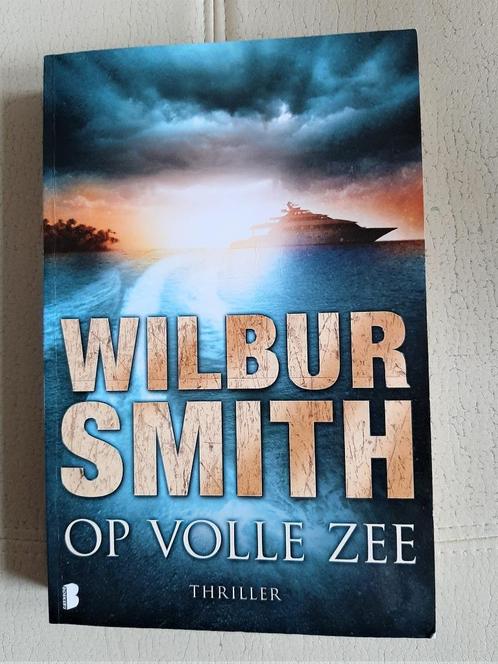 Op volle zee – Wilbur Smith, Boeken, Romans, Zo goed als nieuw, Nederland, Ophalen of Verzenden