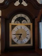 Antieke staande klok, Ophalen