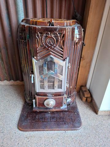 Zeer mooi Emaille Antiek Art Deco houtkacheltje. beschikbaar voor biedingen