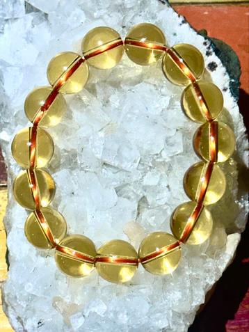 Mooie citrien kleurige (glas) armband. Nieuw. beschikbaar voor biedingen