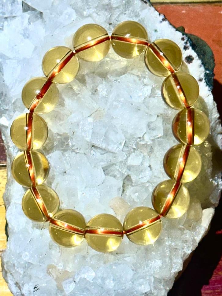 Mooie citrien kleurige (glas) armband. Nieuw., Sieraden, Tassen en Uiterlijk, Armbanden, Nieuw, Overige materialen, Geel, Ophalen of Verzenden