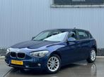 BMW 1-serie 116i High Executive, navi, stoelverwarming, crui, Auto's, BMW, Euro 5, Gebruikt, 4 cilinders, Blauw