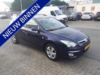 Hyundai i30 CW 1.4i Blue Dynamic (bj 2010), Auto's, Voorwielaandrijving, Stof, Gebruikt, Zwart