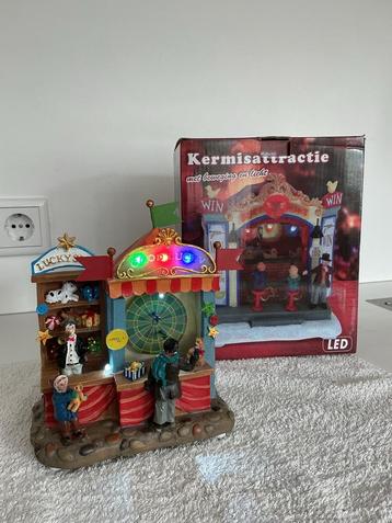 Kerst Kermisattractie met licht en beweging aanv kerstdorp beschikbaar voor biedingen