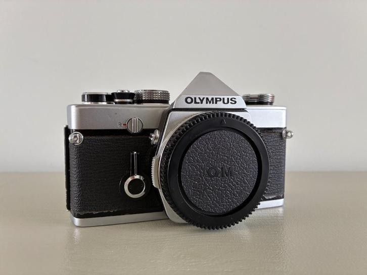 Gereviseerd Olympus OM-1 incl. 50mm en 28mm lenzen, Audio, Tv en Foto, Fotocamera's Analoog, Gebruikt, Spiegelreflex, Olympus
