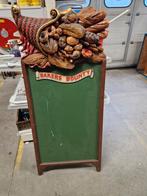 Groot krijt reclame bord voor bakkerswinkel, Ophalen