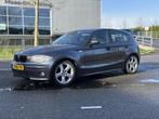 BMW 1-serie 116i High Executive LEER AIRCO CRUISE NAP, Auto's, Zwart, 4 cilinders, 635 kg, 116 pk