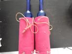 2 blauwe flessen in een roze hoes + 1 extra hoes, Ophalen, Zo goed als nieuw
