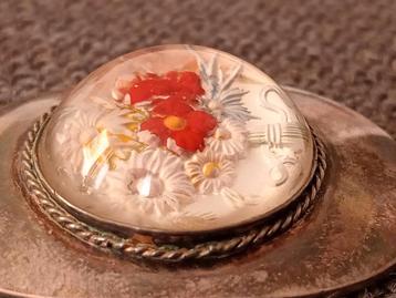 Art deco broche, bloem in glas gemonteerd op zilver beschikbaar voor biedingen