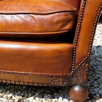 prachtige leren fauteuil gerestaureerd en nieuw bekleed beschikbaar voor biedingen
