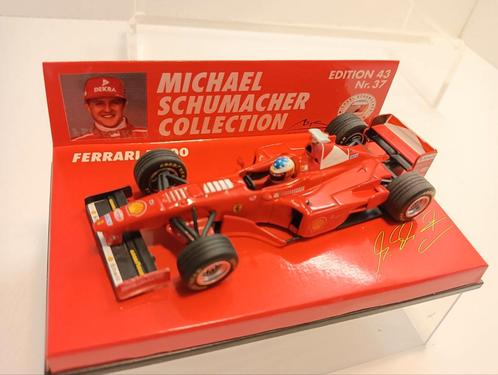 F1 Ferrari f300 m.schumacher Minichamps 1,43, Hobby en Vrije tijd, Modelauto's | 1:43, Zo goed als nieuw, Auto, MiniChamps, Ophalen of Verzenden