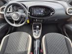 Toyota Aygo X 1.0 VVT-i S-CVT Play Automaat / Navigatie via, Auto's, Toyota, Stof, Gebruikt, Euro 6, Bruin