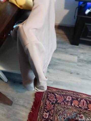 Te koop nieuw beige jasje onesize (maat m-l) beschikbaar voor biedingen