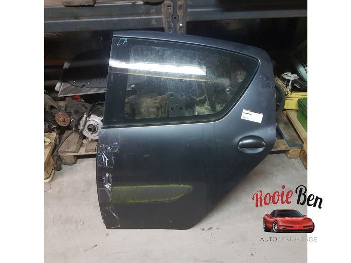 Portier 4Deurs links-achter van een Toyota Aygo, Auto-onderdelen, Carrosserie en Plaatwerk, Deur, Toyota, Gebruikt, 3 maanden garantie