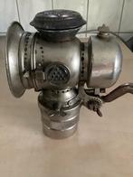 Antieke carbid fietslamp, Ophalen