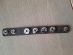 Ona clix armband, Ophalen