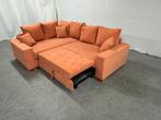 Oranje hoekbank met slaapfunctie en opbergruimte, Ophalen of Verzenden, Gebruikt, Vierpersoons of meer