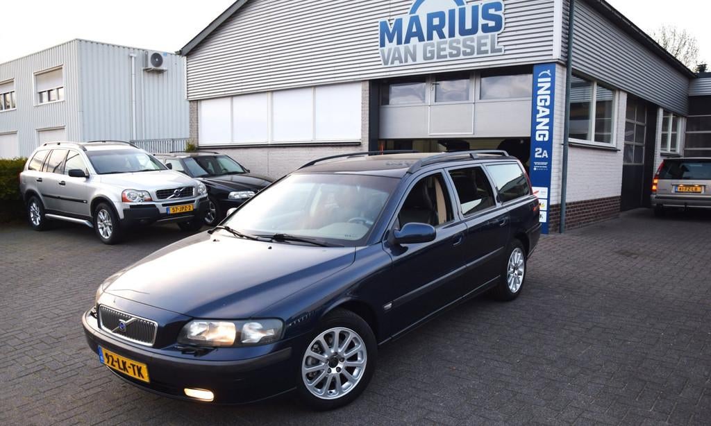 Volvo V70 2.4 Automaat Lpg G3 170 pk, Auto's, Volvo, Blauw, 2435 cc, Grijs, 1567 kg