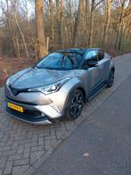 Toyota C-HR 1.8 Hybrid 122pk CVT 2018 Grijs, Auto's, Stof, 725 kg, 4 cilinders, 26 km/l