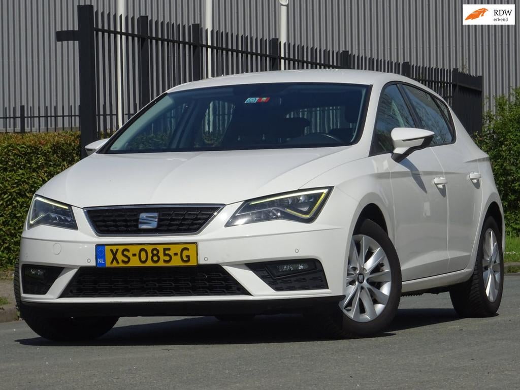 Seat Leon 1.2 TSI Style Business NAVI/CAMERA/PDC/CARPLAY/APK, Auto's, Voorwielaandrijving, Gebruikt, Euro 6, 4 cilinders