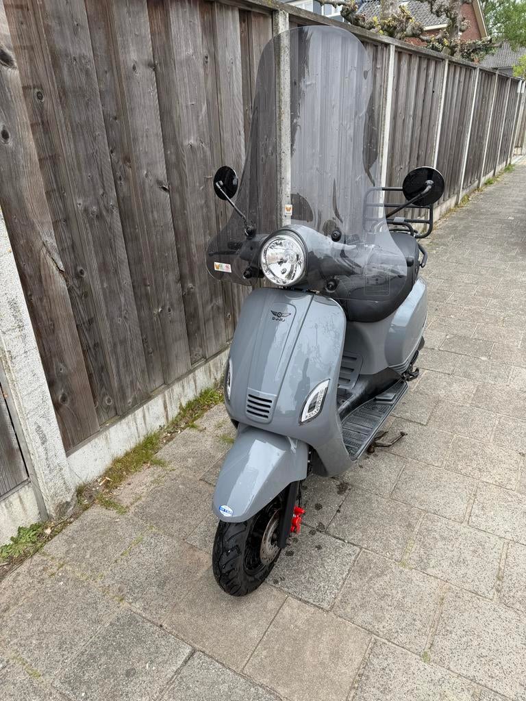 DJJD cashmere Scooter grijs met blauw kenteken, Ophalen of Verzenden, Gebruikt, Maximaal 25 km/u, Benzine