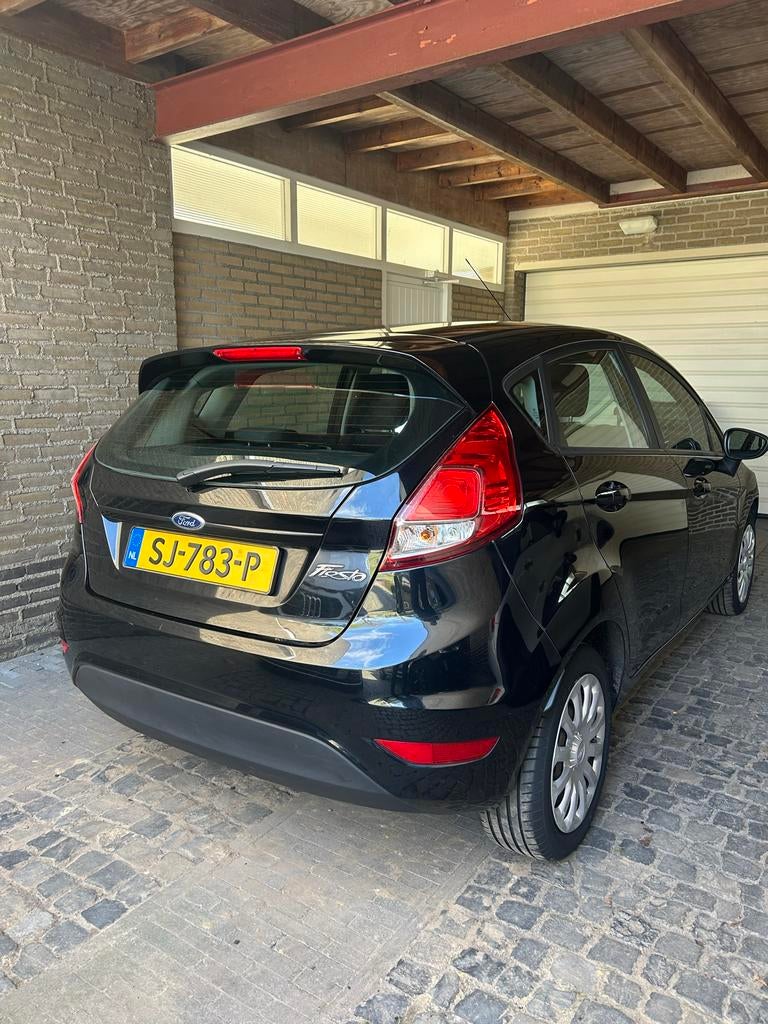 Ford Fiësta 1.25 80PK Duratec 60KW 5DR 2015 Zwart, Auto's, Ford, Voorwielaandrijving, Stof, Zwart, Handgeschakeld