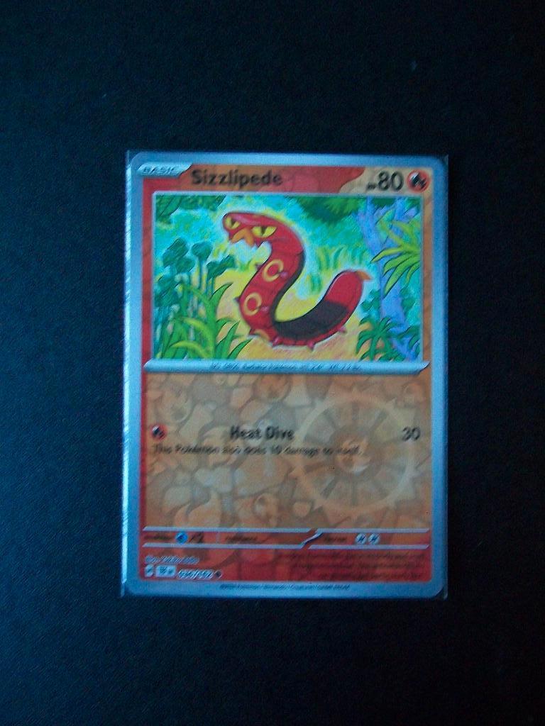 8827: Nieuwe Pokemonkaart holofoil SIZZLIPEDE HP80 (036/162), Verzenden, Nieuw, Losse kaart, Foil