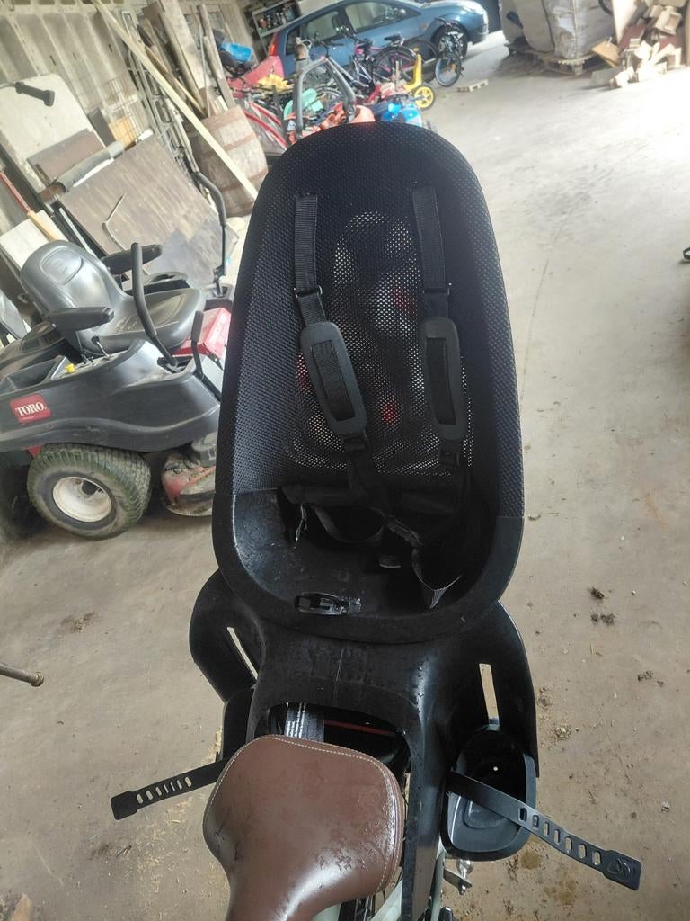 Fietsstoeltje achterop, Ophalen