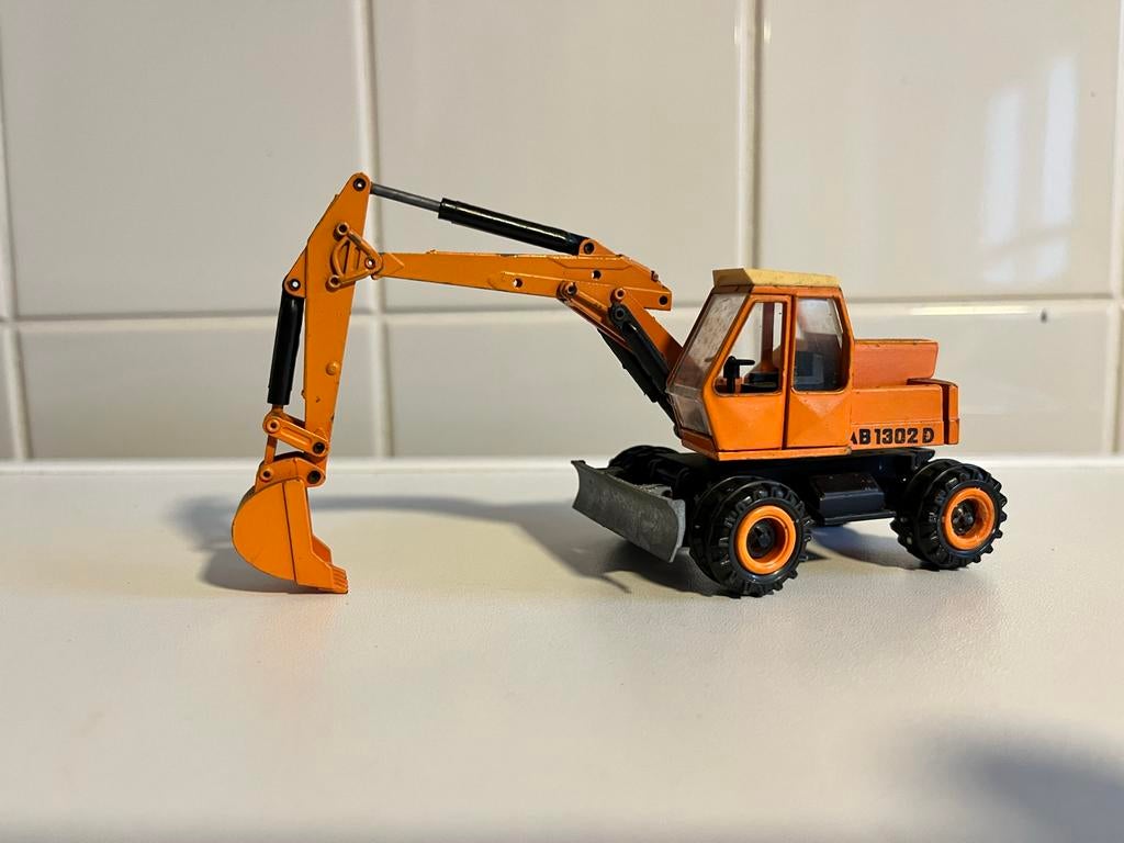 Atlas AB1302D Speelgoed Graafmachine - Oranje Model, Hobby en Vrije tijd, Modelauto's | 1:50, Ophalen of Verzenden, Gebruikt