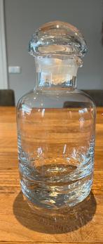 Een mooie glazen karaf, Ophalen